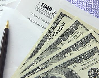 Zarabiasz za&nbsp;granicą? Podatki musisz rozliczyć w&nbsp;Polsce!